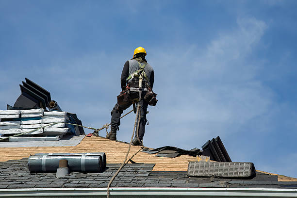 Professional Storm Damage Roof Repair technician working in Green Camp, OH